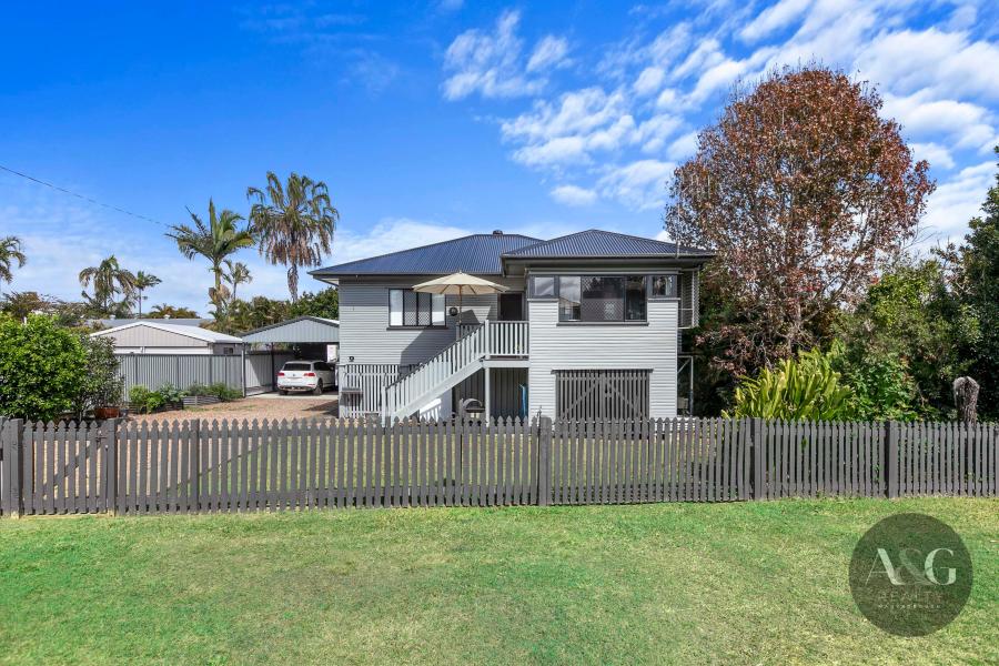 EASY MAINTENANCE HOME WITH BRAND NEW ROOF