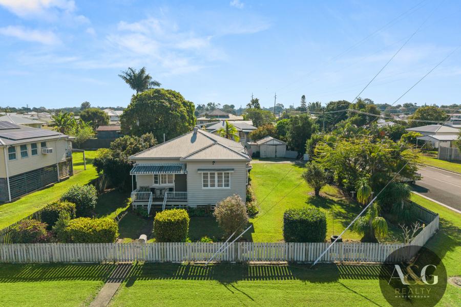 BIG CORNER BLOCK! CLASSIC CHARM! PLENTY OF POTENTIAL!