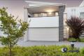 Low Maintenance Townhouse Living in a Thriving Location!