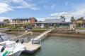 RETIRE BY THE SEA IN ONE OF THE MOST PRESTIGIOUS, HIGH MAST, DEEP WATER CANALS IN NEWPORT