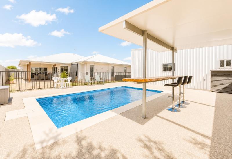 RESORT-STYLE LIVING WITH POOL, SHED & ROOM FOR ALL THE TOYS