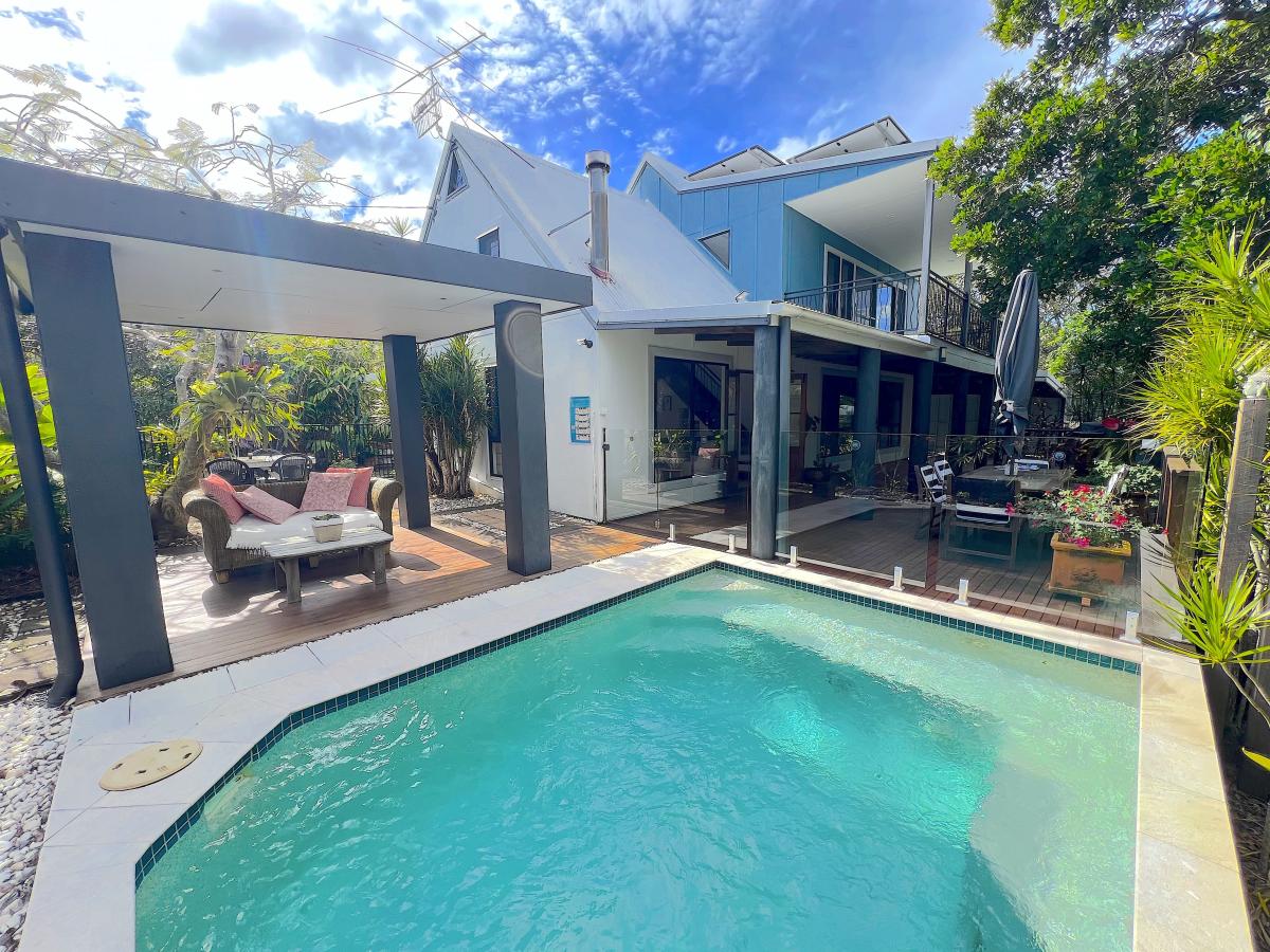 MARCUS BEACH  A home built to entertain inside and out & around the pool