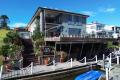 THE ULTIMATE IN FAMILY WATERFRONT LIVING