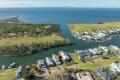 PRESTIGIOUS CANAL FRONT LIVING - PRIME WATERFRONT LAND OPPORTUNITY