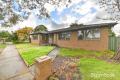 Charming Residence with Updated Bathroom and Double Garage