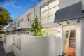CONTEMPORARY SOUTH YARRA LIVING WITH NORTH FACING COURTYARD, SWIMMING POOL, TENNIS COURT & SECURE OFF-STREET CARPARKS