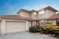 A PRIVATE FAMILY OASIS WITH STUNNING VIEWS OF THE RANGES AND SCHOOL ZONE ALLURE!
