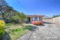 Relaxed Family Living in this 3-Bedroom Home with Generous Backyard