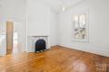 Victorian charmer in an old mansion in St Kilda’s best treelined location.