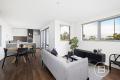 Modern Two-Bedroom Apartment over 2 Levels.