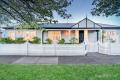 Stylish, Low-Maintenance Living with Impressive Street Presence