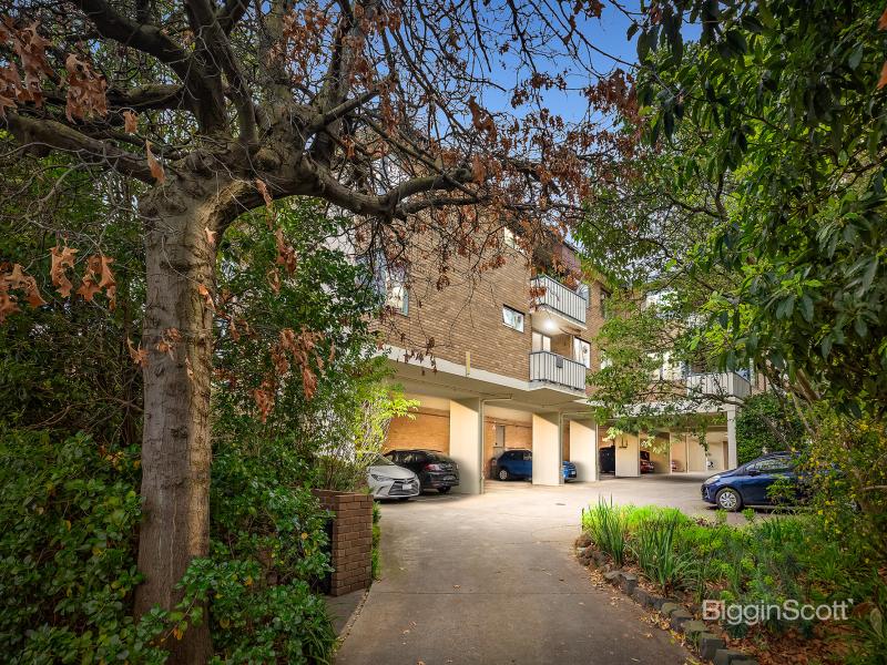 QUIETLY NESTLED IN LEAFY, PRIZED SURROUNDS