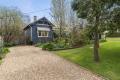 Classic Weatherboard Home with Dual Access and Established Gardens