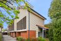 Three-Level Townhouse with Flexible Spaces and Balcony Appeal