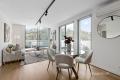 RIVERSIDE SOPHISTICATION WITH NORTH FACING VIEWS OVER THE RIVER!