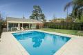 Resort style, executive living in a dress circle location 