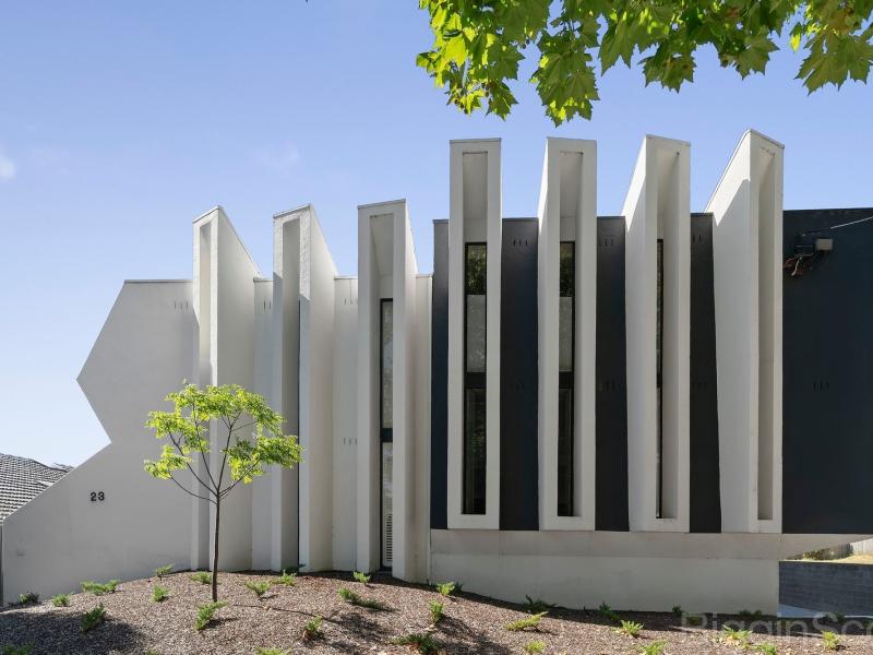 Architecturally Inspired Top-Level Living with City Views