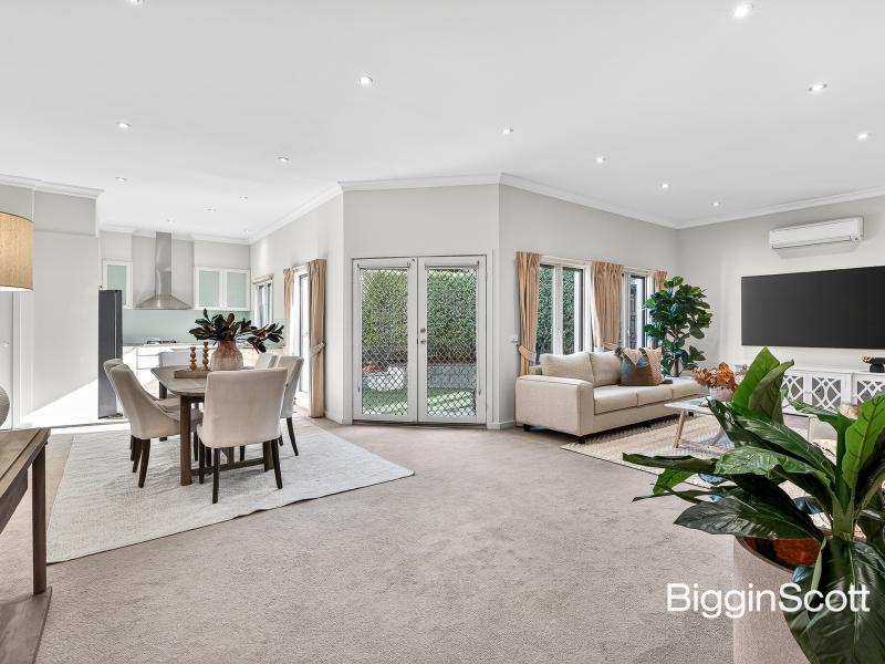 GRAND SPACE, HIGH-END QUALITY, AND IRRESISTIBLE VERSATILITY IN AN ENVIABLE DOUBLE SCHOOL ZONE!