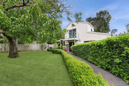 Light-Filled Retreat with Alfresco Terrace & Garden Views
