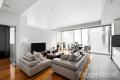 Stunning contemporary apartment featuring tall ceilings and big open plan living