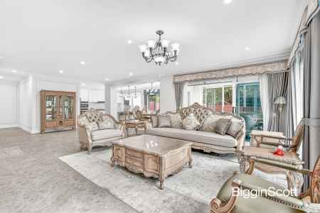 A BREATHTAKING FAMILY HAVEN IN THE GWSC SCHOOL ZONE!