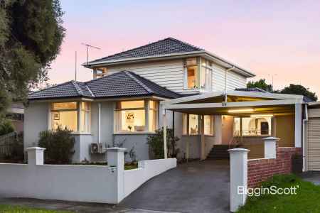 Expansive Family Living with Poolside Entertaining in Dual School Zones