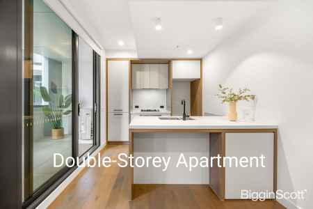 Expansive Dual-Level Apartment with Two Master Bedrooms