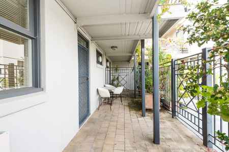 TWO COURTYARDS & PARKING!