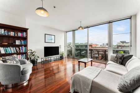Two Levels in the Iconic Red Tulip with Rooftop Views