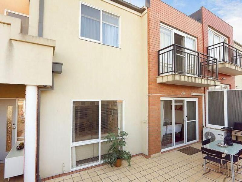 This smartly designed tri-level town home will most certainly delight!