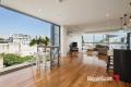 Stunning Split-Level Apartment with Entertainer's Terrace and City Views!