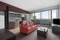 LIGHT FILLED OPEN PLAN LIVING WITH CBD AND MCG VIEWS