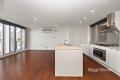 Spacious and Sun-Soaked 2-Bedroom Apartment in East Melbourne’s Prime Location