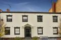 BEAUTIFUL LIGHT FILLED TOP FLOOR ART DECO APARTMENT WITH PARKING IN BOUTIQUE BLOCK IN THE HEART OF EAST MELBOURNE