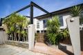 NORTH FACING DUAL LEVEL TOWNHOUSE WITH TWO SECURE CAR SPACES!!