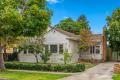 Mid-Century Charm With a North-Facing Backyard and Endless Potential