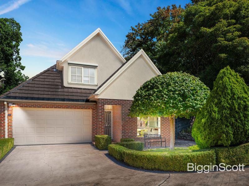 GENEROUS, STYLISH, AND IN A STUNNING SECURITY GATED GARDEN COMPLEX!