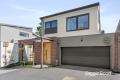 Architecturally Designed Modern Family Living in a Boutique Townhouse Setting