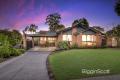 STYLISH & SECURE IN A PRIZED FAMILY LOCATION!