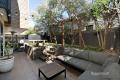 FULLY FURNISHED APARTMENT WITH HUGE PRIVATE COURTYARD!