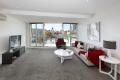 TOP FLOOR 2 BED 2 BATH APARTMENT WITH LARGE BALCONY, OFF STREET PARKING & STORAGE