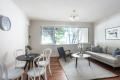 LARGE ONE BEDROOM APARTMENT WITH OFF-STREET PARKING & HEATING / COOLING!