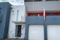 Versatile Townhouse Living with Office Loft & Entertainer’s Terrace