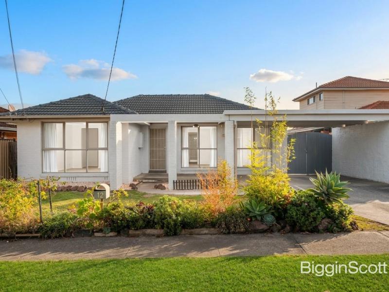 Light-Filled Family Home with Entertainer's Deck in Prime Location