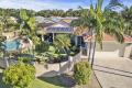 SPRAWLING HOME WITH TROPICAL POOL AND HUGE SIDE ACCESS