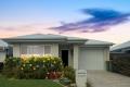 Charming Harmony Haven – Stylish 3-Bedroom Home with Lush Gardens & Prime Position!