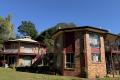 Multi-Dwelling home on Lush, Fertile Land