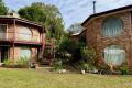 Multi-Dwelling home on Lush, Fertile Land