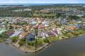 LAKEFRONT LIVING – YOUR WATERFRONT HAVEN AWAITS