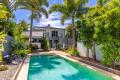 ULTIMATE IN BEACHSIDE LIVING WITH SIDE ACCESS
